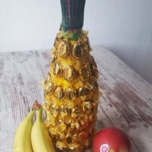 Geschenk Ananas aus Glasflasche und Werther´s Original Bonbons Hand im Glück Header