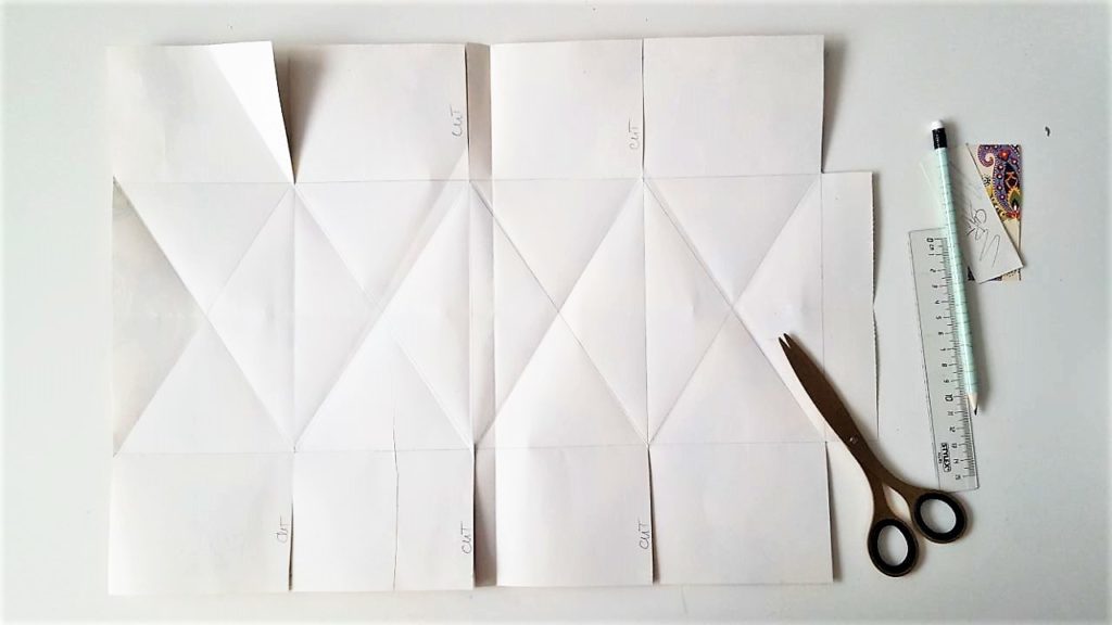 Hand im Glück Tassenverpackung aus Papier Diagonale falten